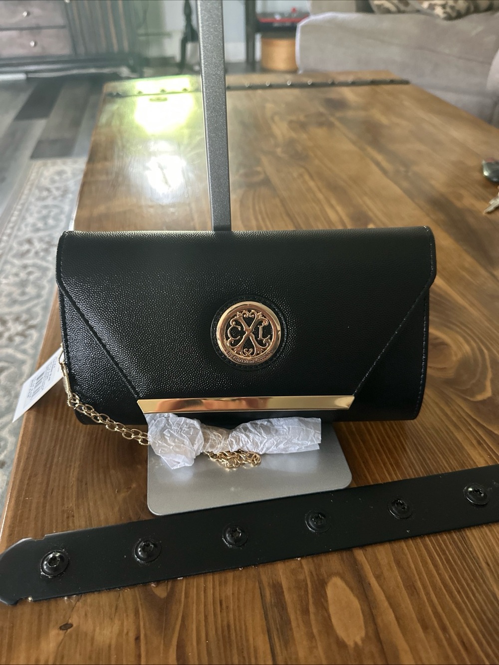 Christian Lacroix Black Clutch with Gold Emblem